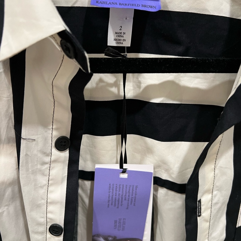 Black and white striped button-up dress